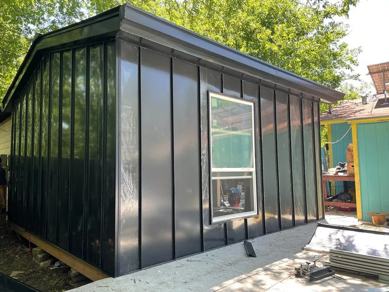 Black standing seam metal wall panels for Metal Roof Installation in Robinson